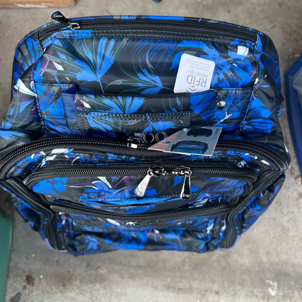 Brand new Lug rolling backpack